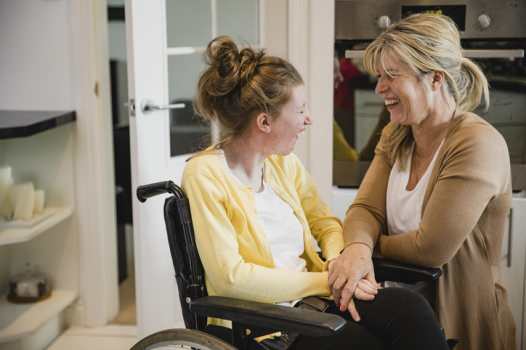 Disability Support Worker and Client smiling