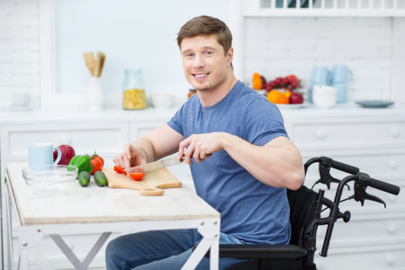 Man cutting vegetables Man cutting vegetables
