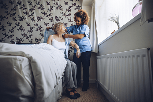 Disability Support Worker Helping Client