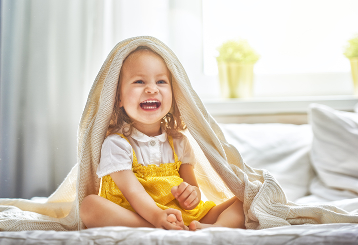 toddler with blanket