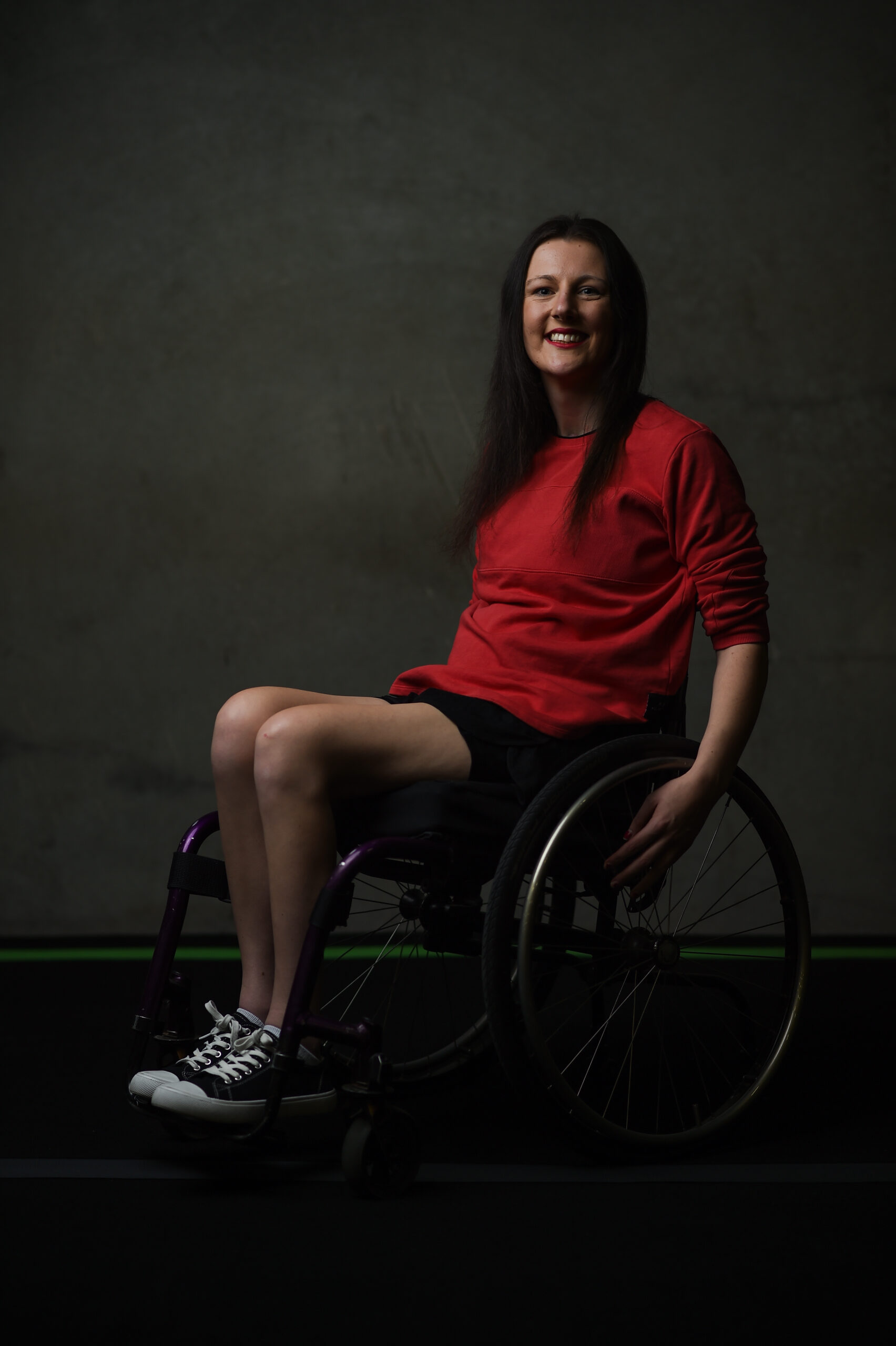 (Photo Mark Jesser) Melbourne.<br />
Emily Quattrocchi Portrait. Woman in a wheelchair in a red tshirt