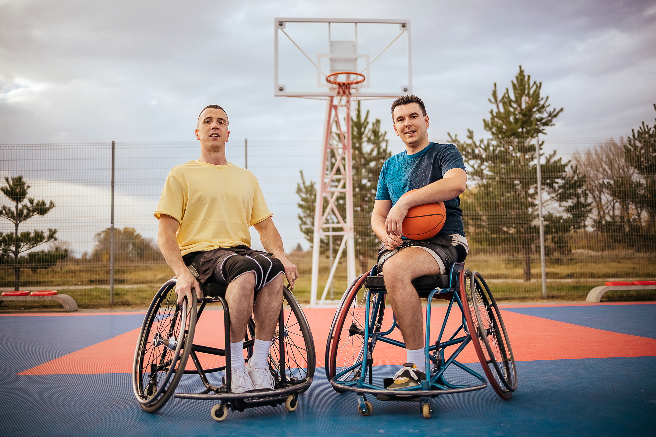 Portrait of two guys in a wheelchair