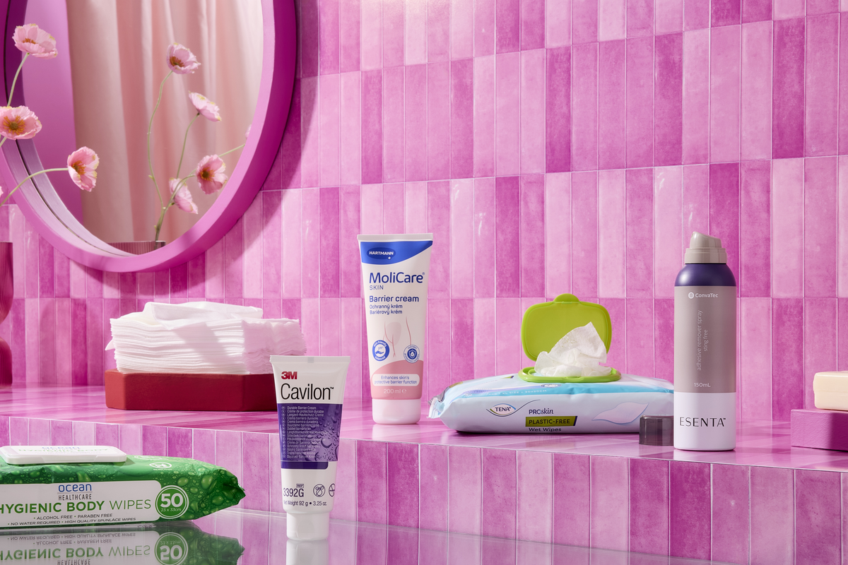 Skincare products including moisturisers, wipes and cleansing products arranged on a bathroom counter.